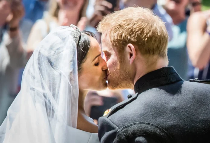 Prince Harry and Meghan Markle kiss