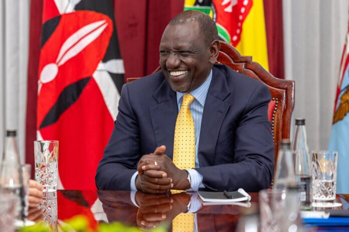President William Ruto loughing