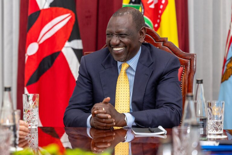 President William Ruto loughing